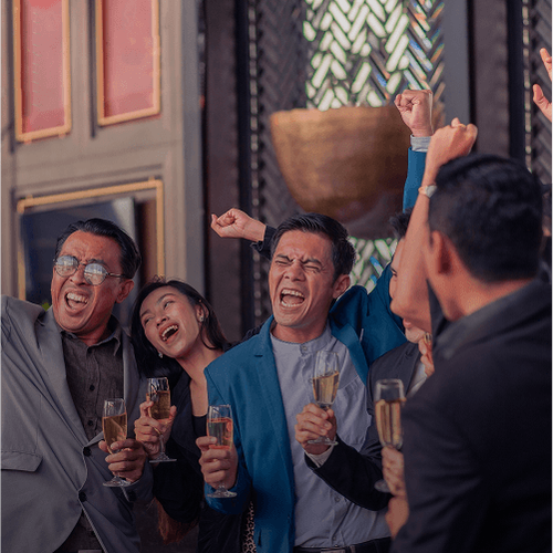 Team celebrating year-end achievements together