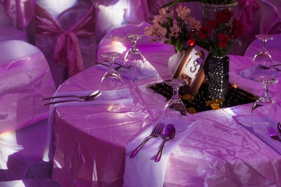 Sophisticated corporate gala dinner inside an elegant marquee tent
